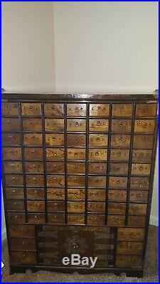 69 Drawer Apothecary Chest Cupboard with Brass Hardware & dark / honey finish