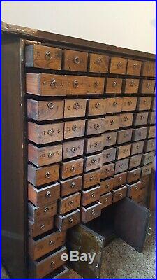 69 Drawer Apothecary Chest Cupboard with Brass Hardware & dark / honey finish