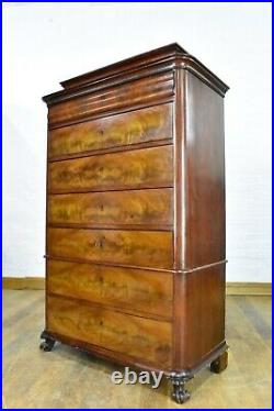 Antique flame mahogany continental tallboy chest of drawers